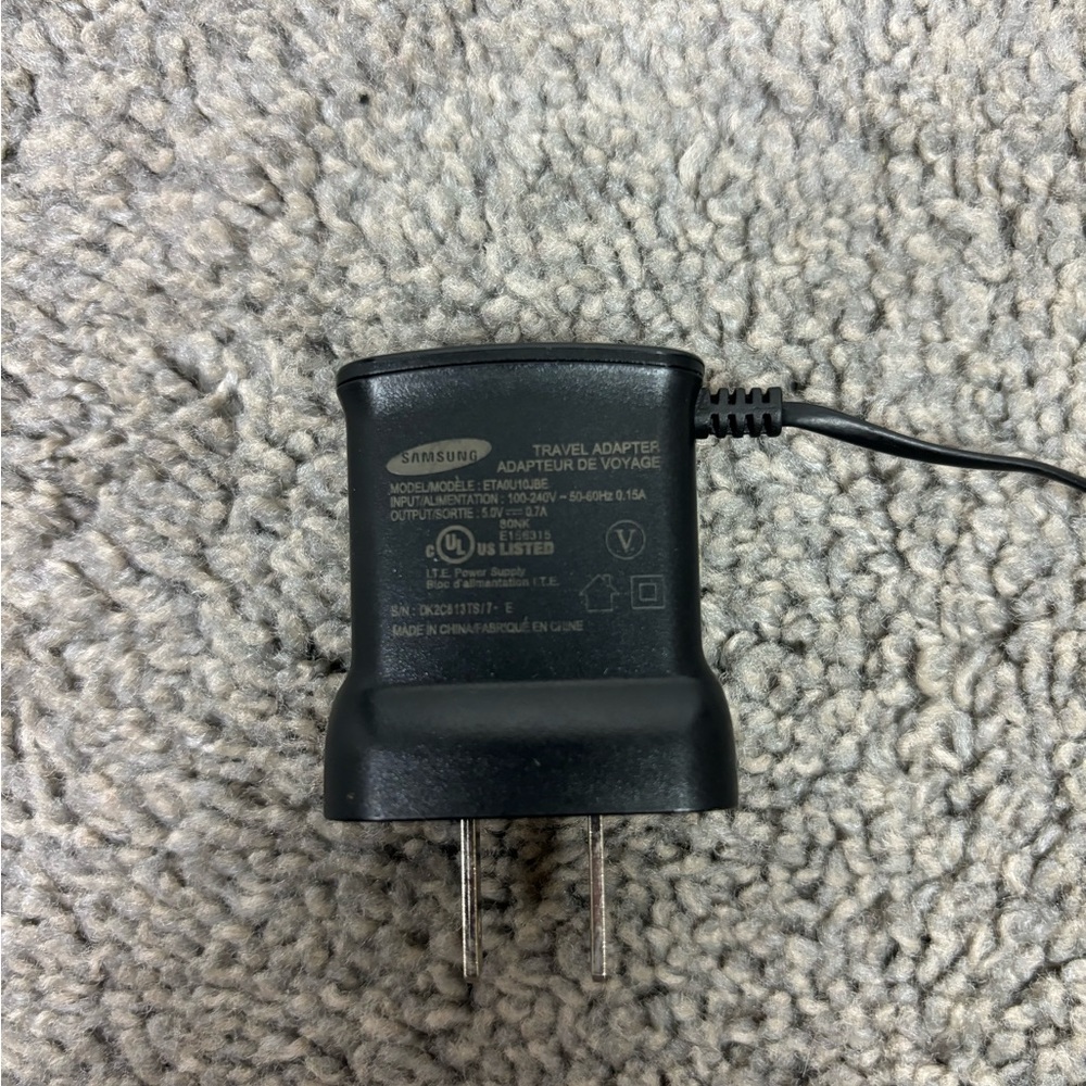 SAMSUNG OEM TRAVEL CHARGER ADAPTER  Input 100-240Vac 50/60Hz‎ Output 5.V 0.7 AMP